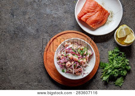 Chilean Salmon Seviche. Fresh Raw Salmon Marinaded With Purple Onion, Coriander In Lemon Juice. Cevi