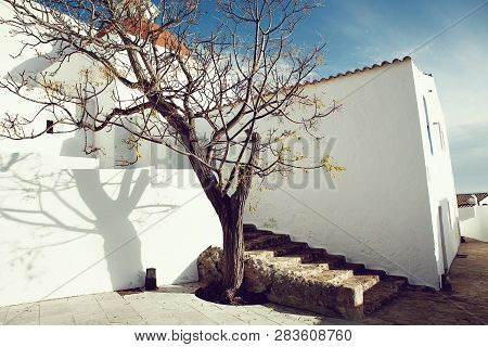 Mediterranean Traditional Architecture In Ibiza: Beautiful Church Of Santa Eularia Des Riu In Ibiza 