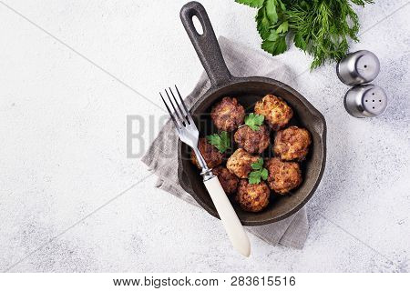 Homemade Beef Meatballs In Frypan On White Background
