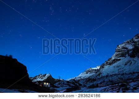 Starry Night On The Mountain Simplon With A Travelers House - An Alps Pass (long Exposure Photograph