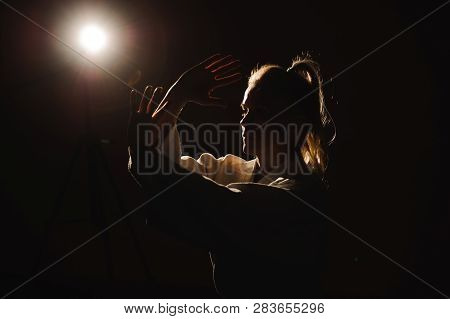 Young Girl Dressed In Hakama Practicing Aikido