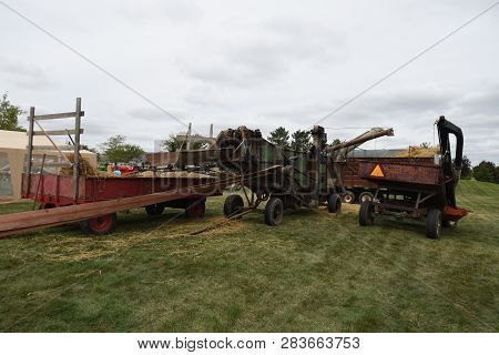 Vintage Farm Machinery Combine Harvester And Wagon On Display At The Bluffton Fall Festival, Bluffto