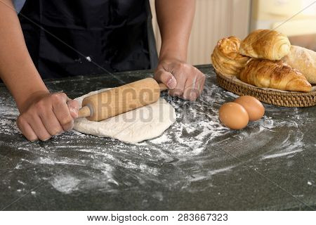 Man Hand Prepare Bakery Raw Material  For Raw Dough For Bread  Bake Or Cake