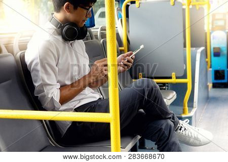 Young Businessman Passenger Use Time