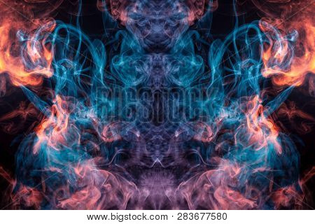 Cloud Of Red And Blue  Smoke  In The Form Of A Skull, Monster, Dragon  On A Black Isolated Backgroun