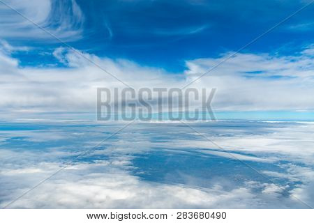 Dark Blue Sky Horizon, Up In The Air. Viewed From An Airplane Window.