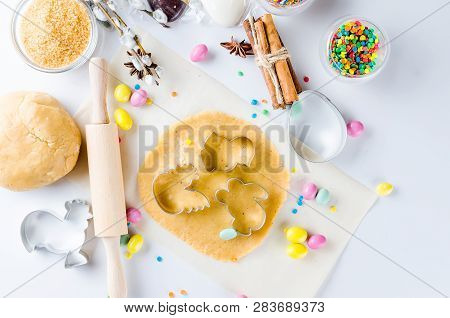 Easter Cooking Background, Dough And Indredients, Cuts For Cookies And Colored Sugar Décor For Bakin