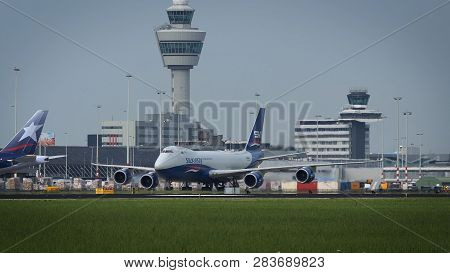Amsterdam, Netherlands - July 27, 2017: Side View Of Silk Way West Airlines Boeing 747-83q(f) Vq-bvc