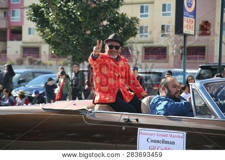 LOS ANGELES - FEBRUARY 9, 2019: Golden Dragon Parade in the streets of China Town Los Angeles. Councilman Gil Cedillo waves to the crowd at the Chinese New Year celebration 2019.

