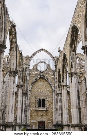 Lisbon, Portugal - July 19 2018: Carmo Convent Church Ruins. Day View Of Main Nave Ruins And Arches 