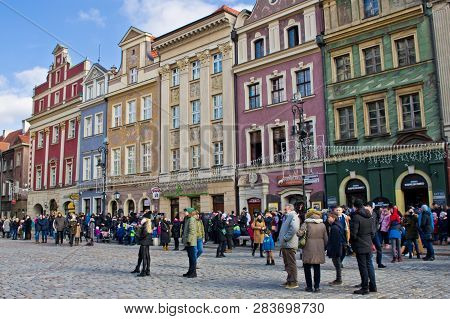 Poznan/poland - February 6th 2019: Crowd Of Tourists Admiring Old Town Square, Taking Photos Of The 