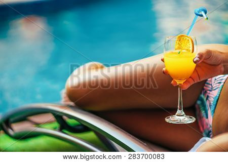 A Beauty Asian Woman Enjoying With Her Summer Vacation At Swimming Pool In Pattaya, Thailand.