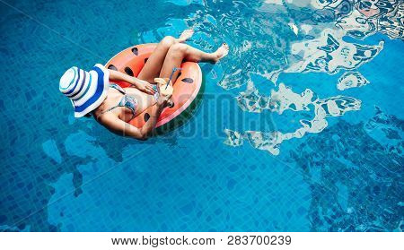 A Beauty Asian Woman Enjoying With Her Summer Vacation At Swimming Pool In Pattaya, Thailand.