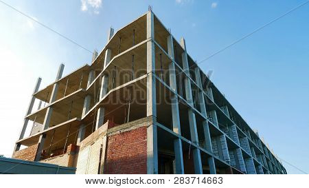 Construction Site Background. Concrete Building Under Construction.