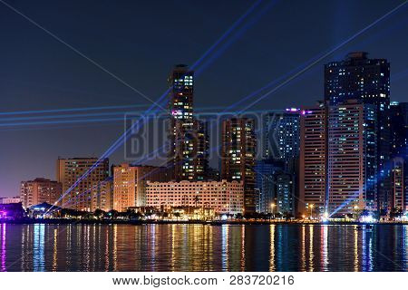 Sharjah Modern Skyline Iluminated During Light Festival At Night