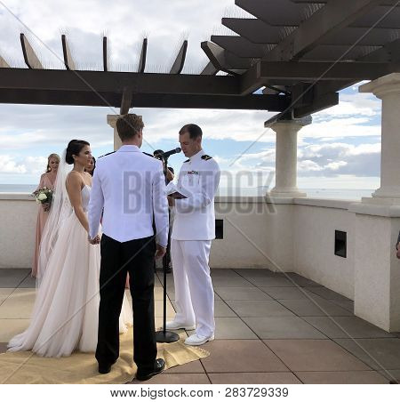 San Diego, California, October, 13, 2018  Bride And Groom Exchange Vows At A Military Wedding