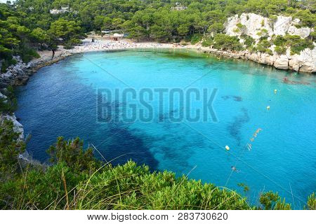 Turquoise Water In Bay Cala Macarella On Menorca Island In Spain.