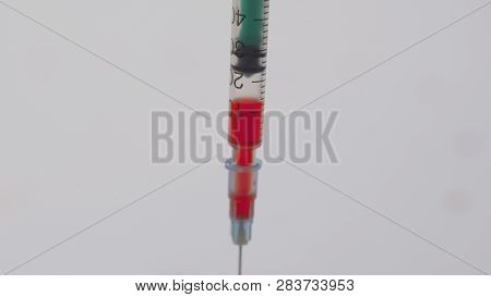 Blood Sampling With Syringe And Needle For Analysis