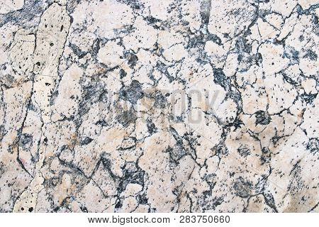 Surface Of The Patterned White Marble Slab Closeup. Beautiful Natural Stone. Texture Of Marble Close