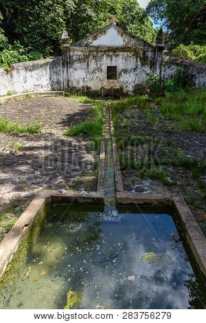 Old Colonial Fountain Of Mirititiua At Alcantara On Brazil