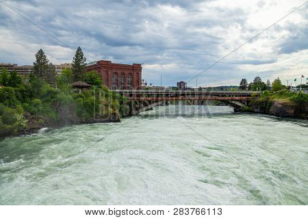 The Spokane River In Spring Flood Near Downtown Spokane, Washington, Usa