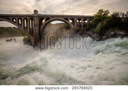 The Spokane River In Spring Flood Near Downtown Spokane, Washington, Usa
