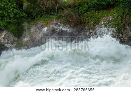 The Spokane River In Spring Flood Near Downtown Spokane, Washington, Usa
