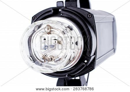 Photo Studio Strobe Light Flash Bulb. Close Up View Of Professional Studio Strobe Flash Lamp Isolate