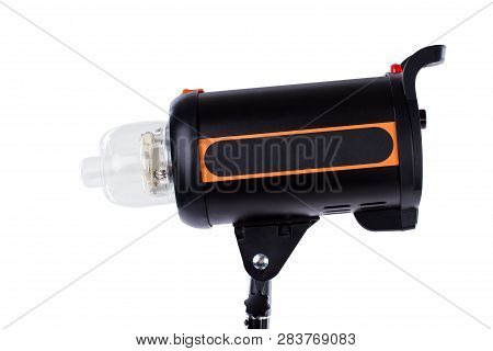 Close Up Photo Studio Strobe Flash Light. Side View Head Of Studio Flash Strobe Lamp Light Isolated 