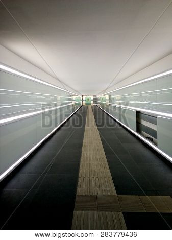 Modern Pedastrians Tunnel With Linear White Neon Lights