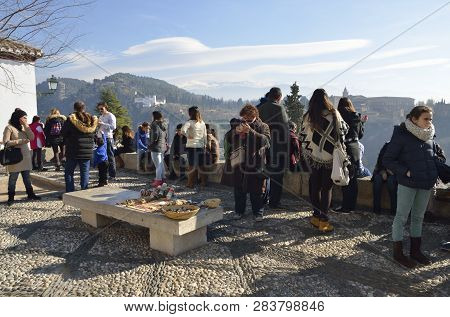 Granada, Spain - December 27, 2014: People At  Plaza Of San Nicholas In The Albaicin District In Gra