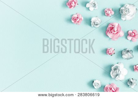 Flowers Composition. Frame Made Of Rose Flowers On Pastel Blue Background. Valentines Day, Mothers D