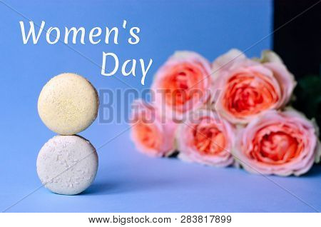 Two Macaroons, Roses And The Text Womens Day. Two Macaroons Mimic The Number 8. March 8 Womens Day.