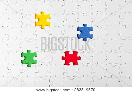 Collected Whole White Puzzles With Color Inserts Inside Top View. Template, Blank For Business Proje