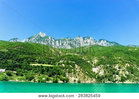 Beautiful View Of Koman Lake With Mountains Near Shkoder, Albania.