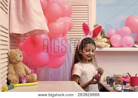 Daughter Paint Handmade Egg At Party Balloons. Gaughter Or Little Girl Kid Paint Easter Eggs
