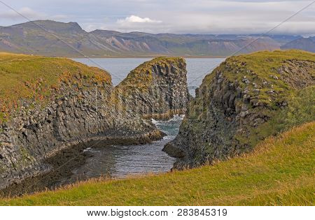Hidden Cove Of Lava Rocks On The Coast Near Arnarstapi; Iceland