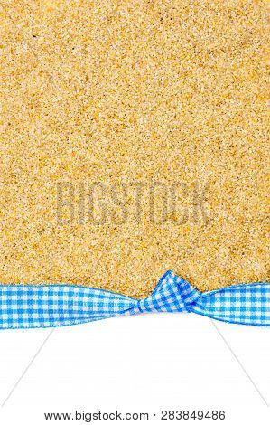 Birthday Gift Card With Blue Bow And Ribbon In The Middle And Background Made Of Sand With Plenty Co