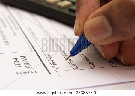 Close Up Of Concept Showing Of Filling Indian Income Tax Form Itr 4