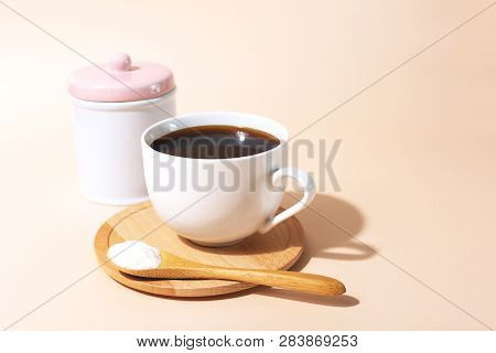 Collagen Powder And Morning Coffee. Health And Beauty Suppliment Concept.