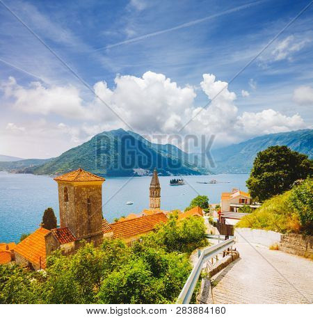 Wonderful scene of famous Kotor bay (Boka Kotorska) and St. Nikola Church. Location place Perast, Montenegro, Adriatic sea, Europe. Scenic image of tourist destination. Discover the beauty of earth.