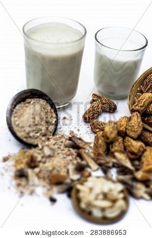 Close Up Of Popular Indian And Asian Winter Drink Isolated On White I.e. Kharek Ka Dudh Or Dried Dat