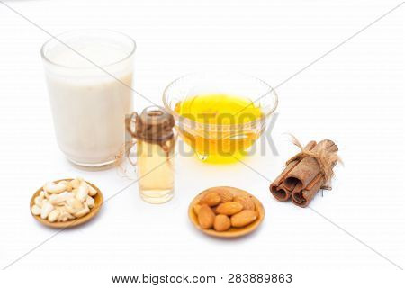Close Up Of Popular Indian & Asian Winter Drink Isolated On White I.e Honey Milk Or Shahad Ka Dudh I