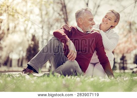 Handsome Dray-haired Man Looking At His Wife