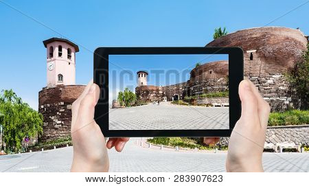 Travel Concept - Tourist Photographs Of Entrance To Old Ankara Castle On Gozcu Square Of Ankara City