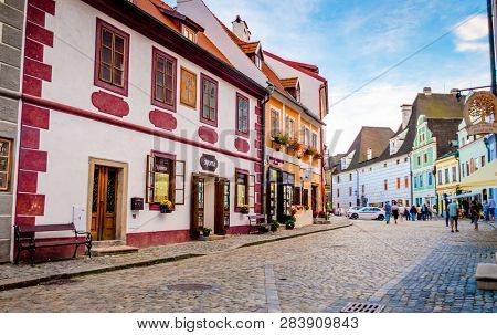 Krumlov, Czech Republic - 21 September 2018: View of Cesky Krumlov narrow street with beautiful ancient arcitecture and tourists