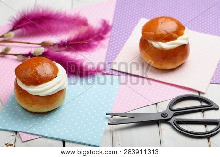 Fastelavnsris and other Fastelavn decorations, scissors and traditional buns