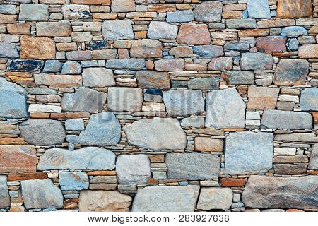 Abstract brick stone background in Historical Ruins in Delos Island near Mikonos, Greece.