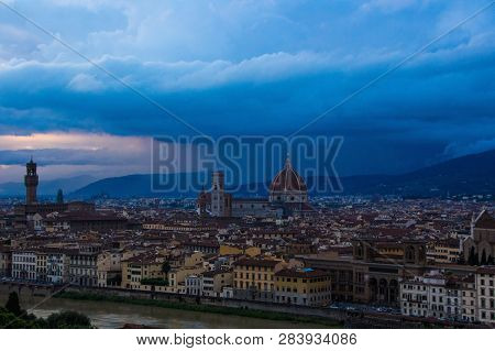 Cathedral Of Santa Maria Del Fiore (duomo) And Arnolfo Tower Of Palazzo Vecchio. Night View From Nig