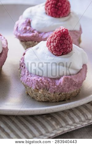 Homemade Cake With Raw Strawberries And Cashew Cream On Almond Nut Dough, Healthy Vegan Food Concept